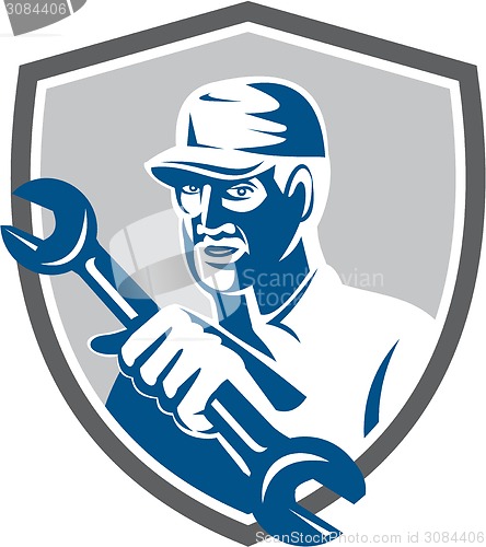 Image of Mechanic Holding Spanner Wrench Shield Retro