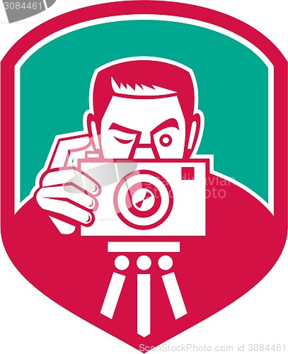 Image of Photographer Shooting Camera Shield Retro