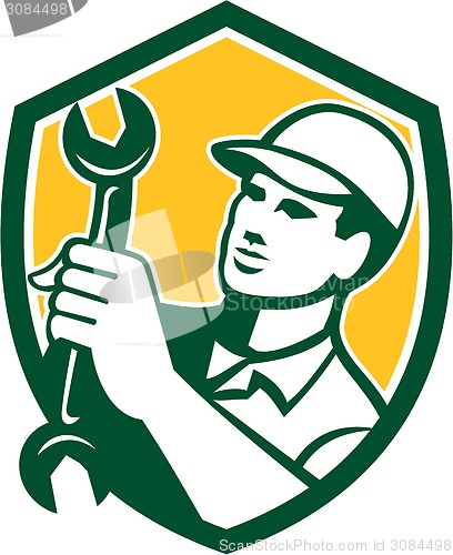 Image of Mechanic Holding Spanner Wrench Shield Retro