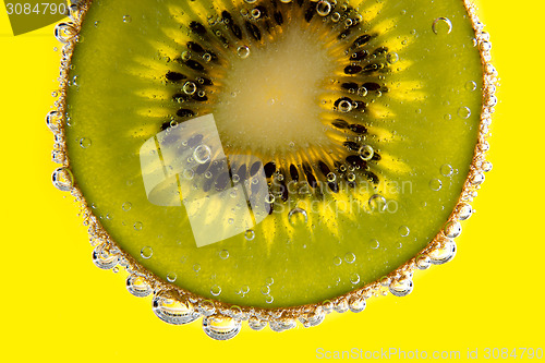 Image of Kiwi slice with bubbles