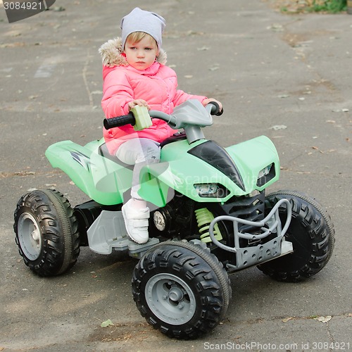Image of attractive little girl on outdoor