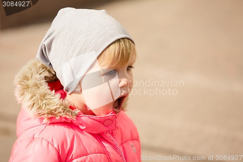 Image of attractive little girl on outdoor