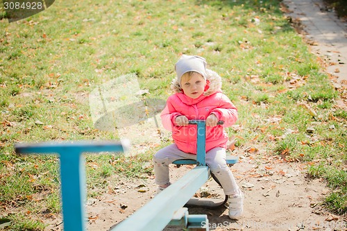 Image of attractive little girl on outdoor