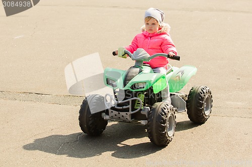 Image of attractive little girl on outdoor