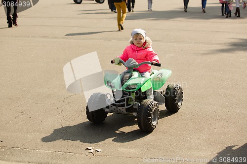Image of attractive little girl on outdoor