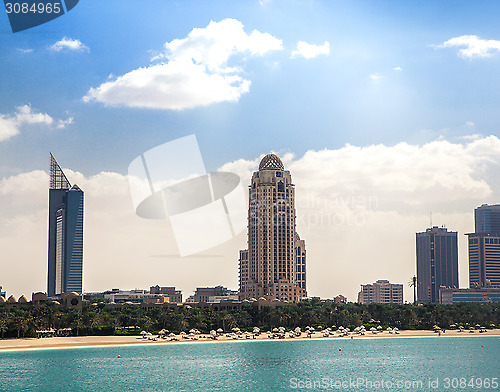 Image of luxury blue building skyscraper, bay ocean