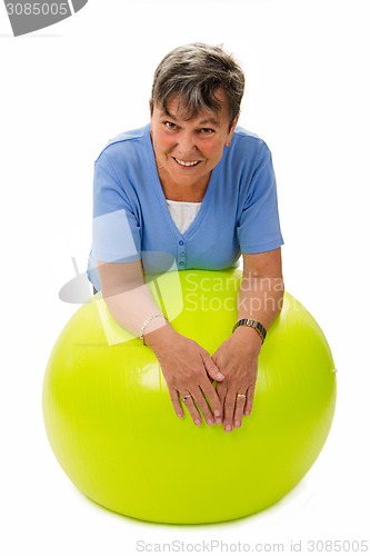 Image of Senior woman on a ball