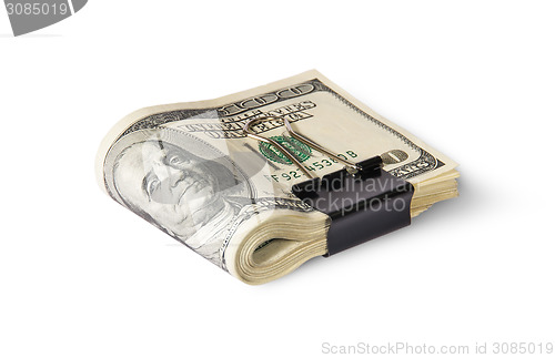 Image of Dollar Bills With Clip Lying