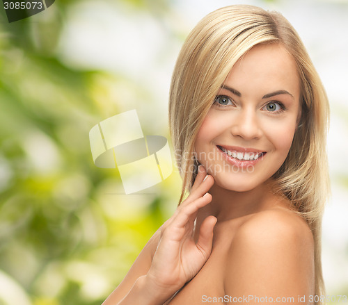 Image of face of beautiful young happy woman with long hair