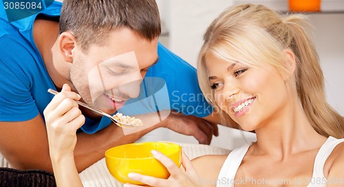 Image of happy couple at home