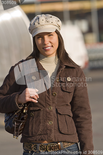 Image of Smiling woman wearing hat