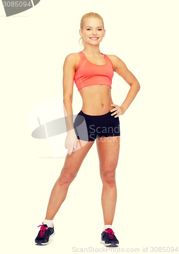 Image of beautiful athletic woman in sportswear