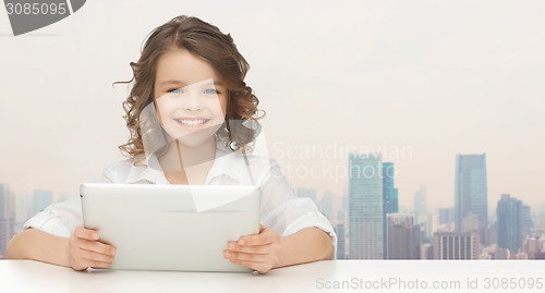 Image of happy smiling girl with tablet pc computer