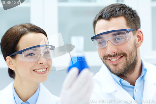 Image of young scientists making test or research in lab