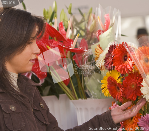 Image of Woman buying flowers