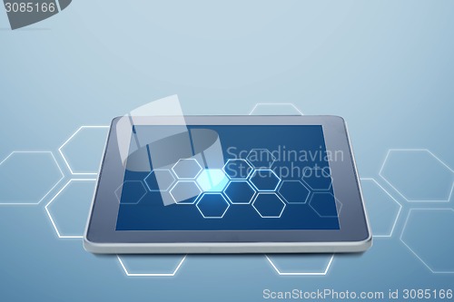 Image of tablet pc computer with cell pattern on screen