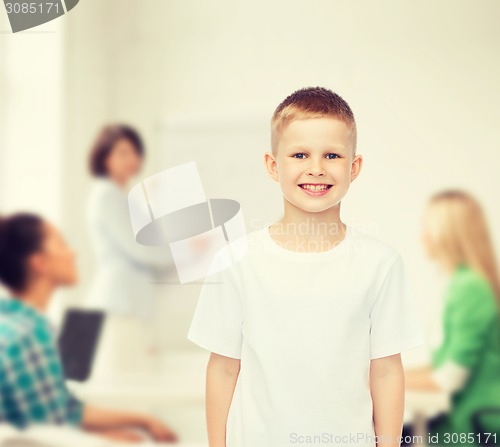 Image of smiling little boy in white blank t-shirt