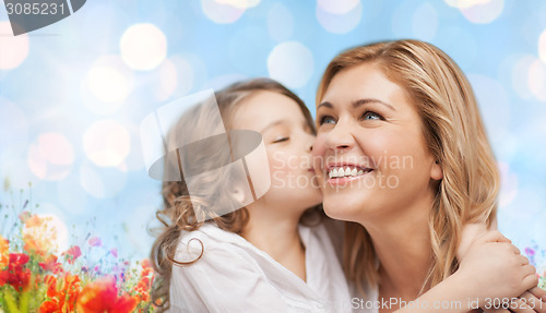 Image of happy mother and daughter hugging