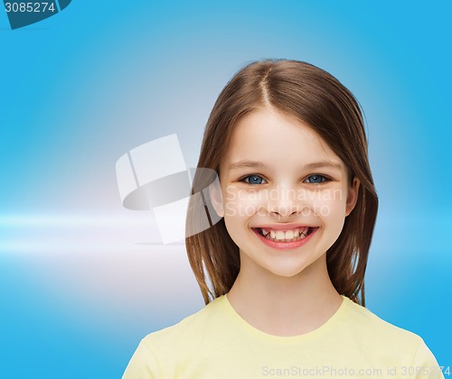 Image of smiling little girl over white background