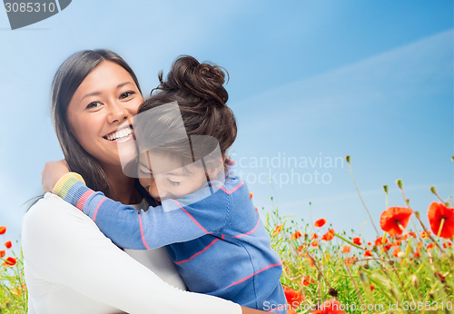 Image of happy mother and daughter hugging