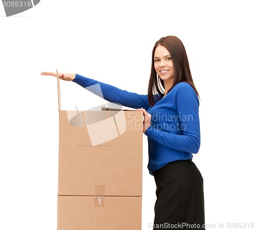 Image of businesswoman with big boxes