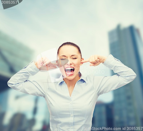 Image of angry screaming businesswoman