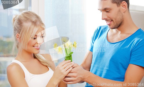 Image of romantic couple with flowers