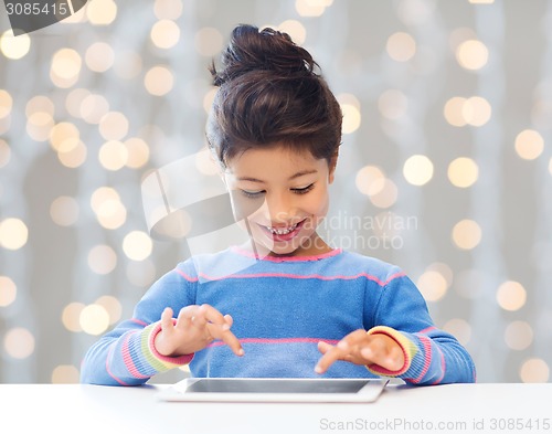 Image of happy little girl with tablet pc computer