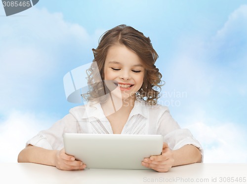 Image of happy smiling girl with tablet pc computer