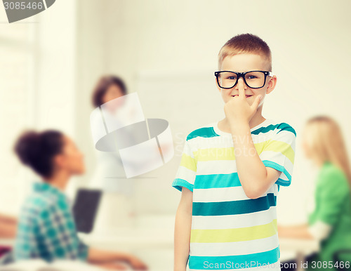 Image of smiling little boy in eyeglasses