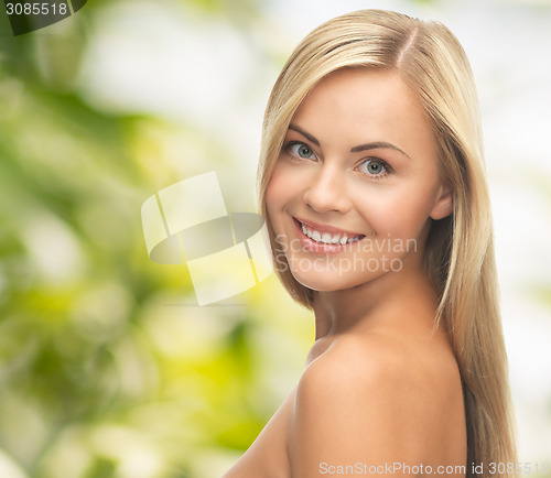 Image of face of beautiful young happy woman with long hair
