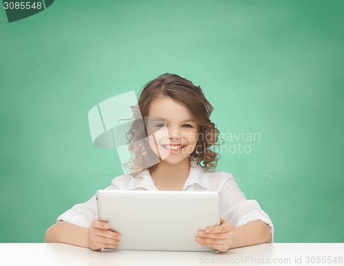 Image of happy smiling girl with tablet pc computer