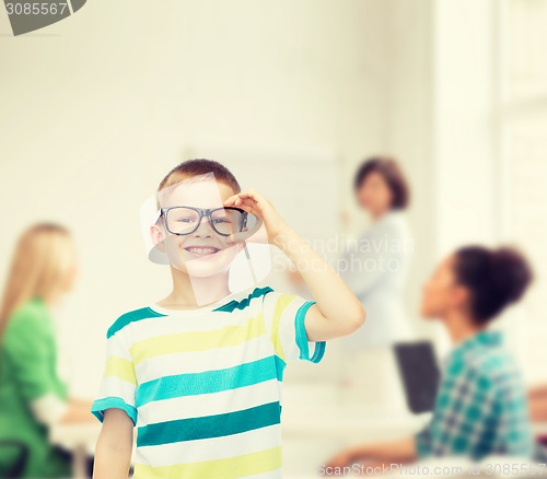 Image of smiling little boy in eyeglasses