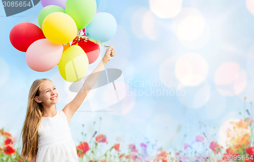 Image of happy girl with colorful balloons