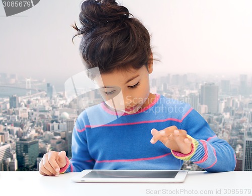 Image of little girl with tablet pc