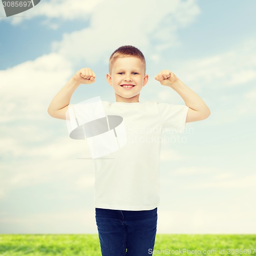 Image of smiling little boy in white blank t-shirt