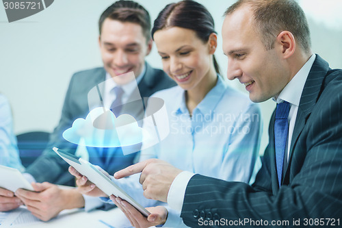 Image of business team with tablet pc having discussion