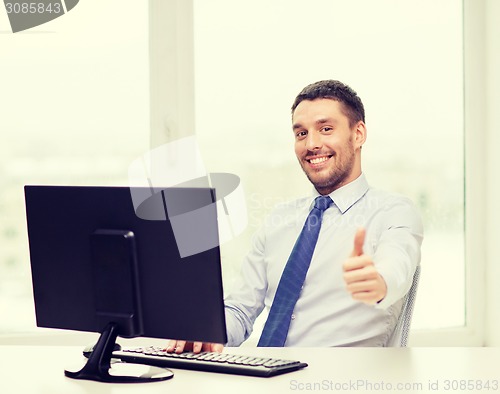 Image of smiling businessman or student with computer