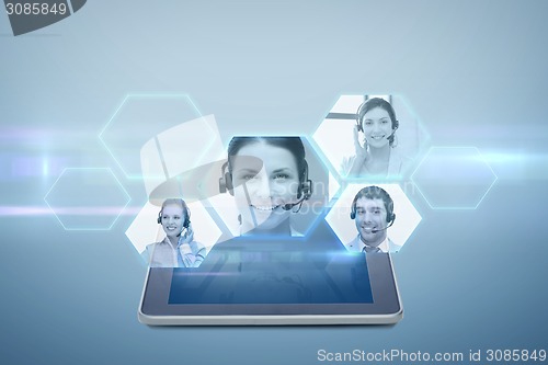 Image of tablet pc computer with video chat projection