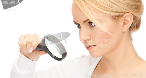 Image of woman with magnifying glass