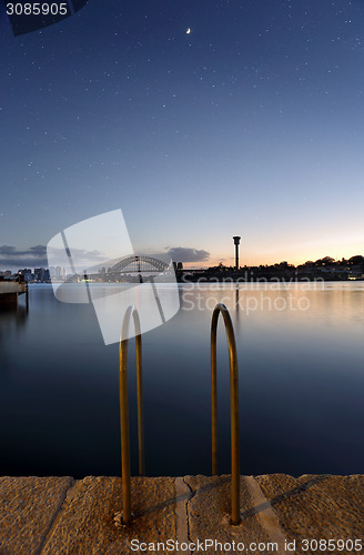 Image of Mezzaluna over Sydney Harbour Bridge at twilight