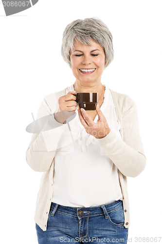 Image of Elderly woman drinking coffee