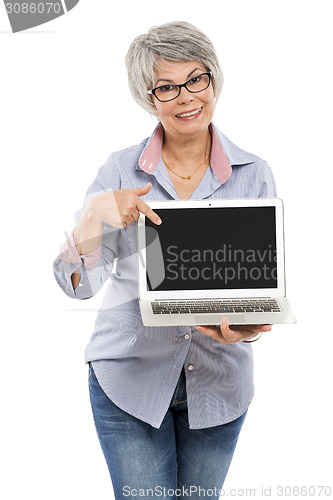 Image of Elderly woman showing something on a laptop