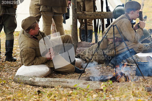 Image of Soldiers resting near the fire