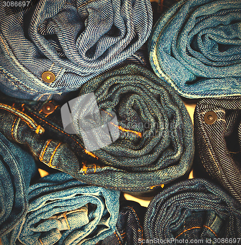 Image of jeans trousers stack