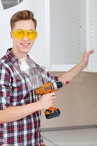 Image of master with screwdriver
