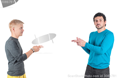 Image of Handsome guys showing on each other with fingers
