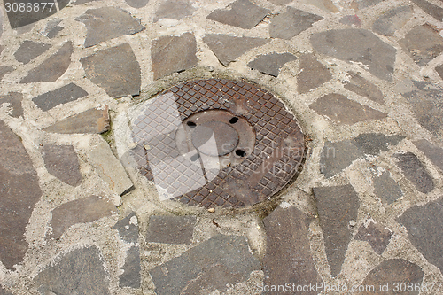 Image of pipe on old town street