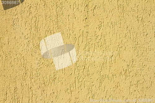 Image of yellow real plaster texture