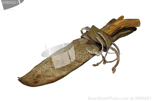 Image of old hunting knife in leather scabbard